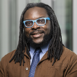 John Washington smiles for the camera