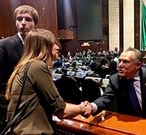 Congressman Marco Adame (right) shakes hands with a Schar School student on the Mexico Study Abroad trip.
