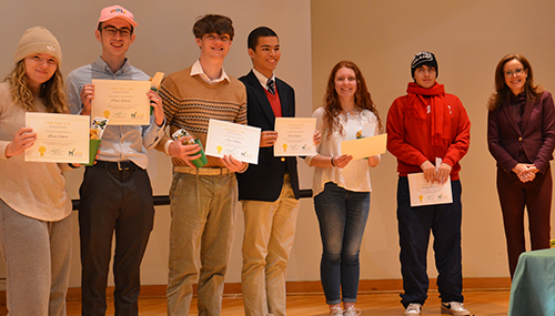 Jennifer Victor stands on the far right along with a group of Democracy Lab students.