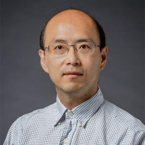 GM SEOR professor Ju Xie wears glasses and a light shirt