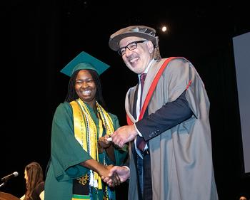 Celine Apenteng with Dean Alp at Carter School Degree Celebration